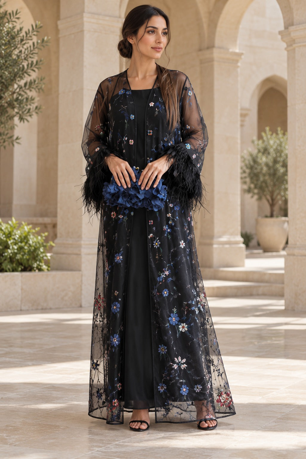 Layali black open-front abaya with sheer sleeves, multicolour floral detailing and statement feather-trim cuffs, front view